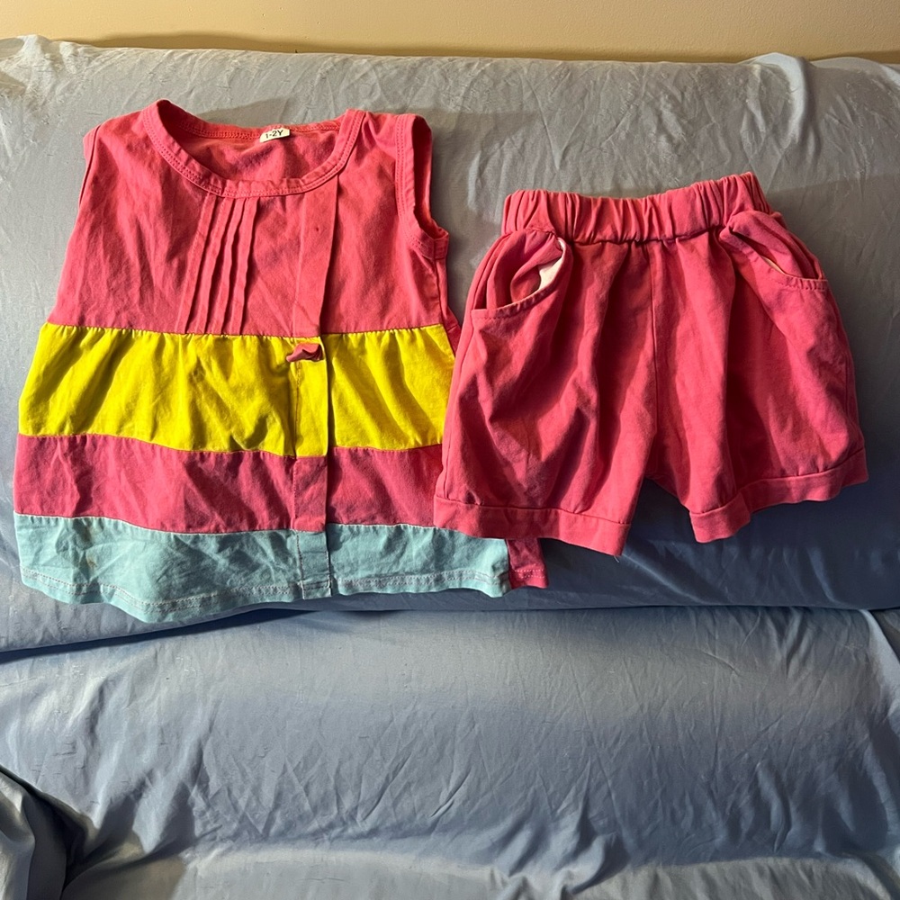 Pink/yellow/blue sleeveless top with matching pink shorts
